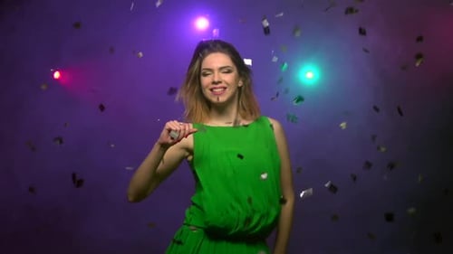 Close-up Dancing of Young Woman in Green Dress, Slow Motion