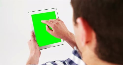 Man using digital tablet