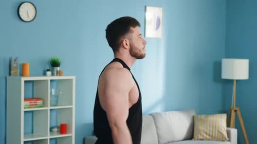 Man Performing Exercise Routine Indoors