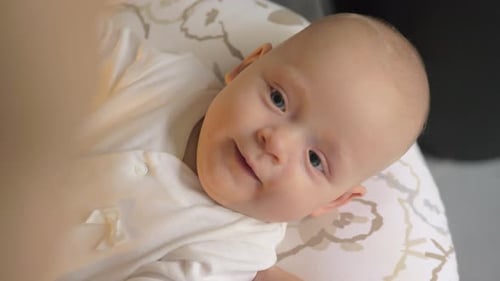 Sweet Close-Up of Baby Resting on Pillow
