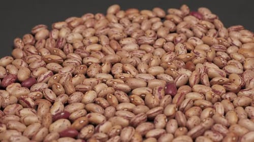 Close Up of Pinto Beans on Black Background