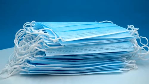Stack of Blue Surgical Masks for Healthcare