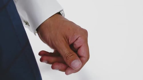 Businessman in White Shirt with Cuff Link in Modern Office