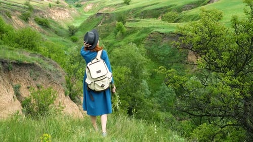 Girl Looking At The Ravine
