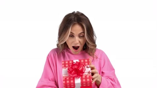 Woman Receives Gift with Joy and Gratitude