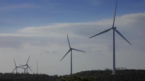 Windmills or Wind Turbine in Rotation