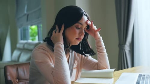 Caucasian cute young girl student feeling bore from doing homework, assigned job and learn from home