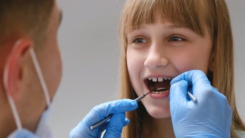 Child Patient at Dentist Exam