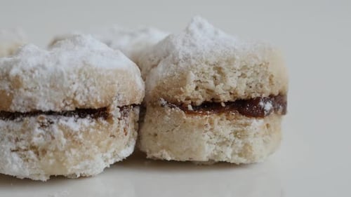 Tasty little vanilla dessert stuffed with jam slow tilt 4K 2160p 30fps UltraHD footage - Serbian van