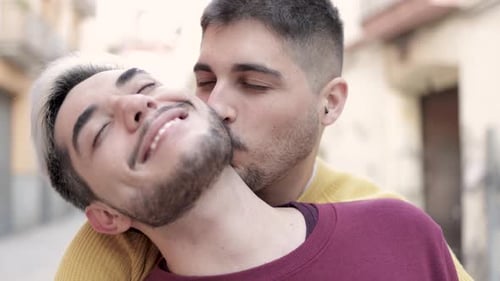 Lgbt Gay Male Couple Kissing and Hugging Outdoor in the City
