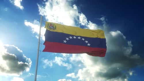 Venezuelan Flag Waving Proudly Against a Sunny Blue Sky