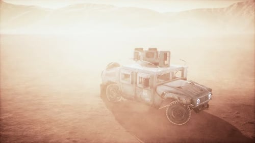 Military Patrol Car on Sunset in Desert Storm