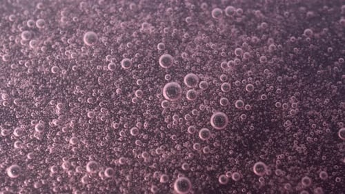 Macro Rotating Lots Of Pink Bubbles Background