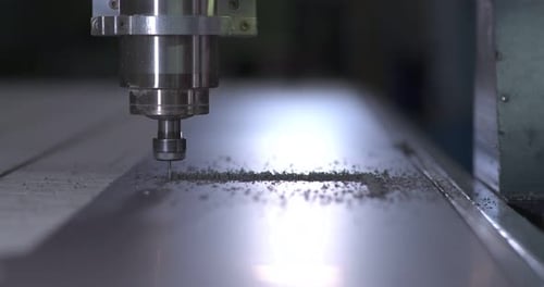 Milling Machine Cutting Metal Sheet in Factory