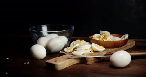 Hard Boiled Eggs Sliced on Cutting Board