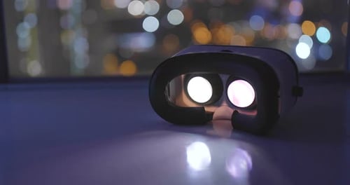 Playing movie inside VR device with city background at night
