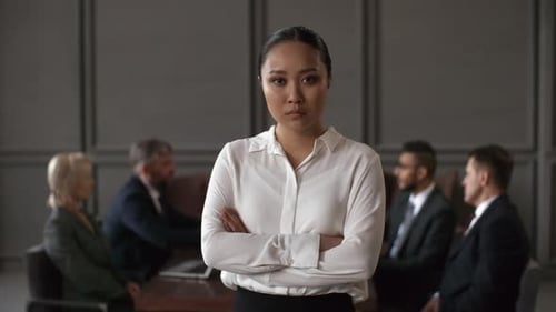 Asian Secretary Posing during Corporate Meeting