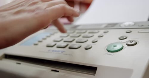Close Up Hand of a Woman Using Fax, Presses the Button and Picks Up the Phone,