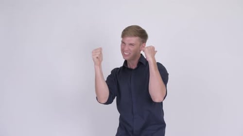 Enthusiastic Man Giving Thumbs Up Gesture