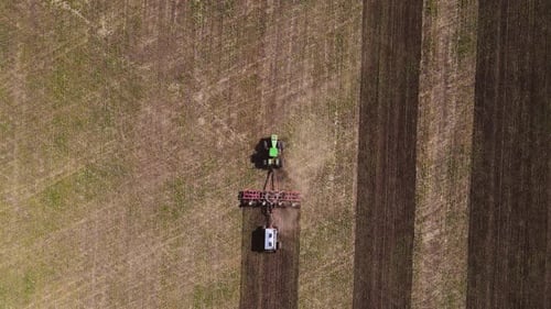 Tractor Preparing Field From Bird's Eye View