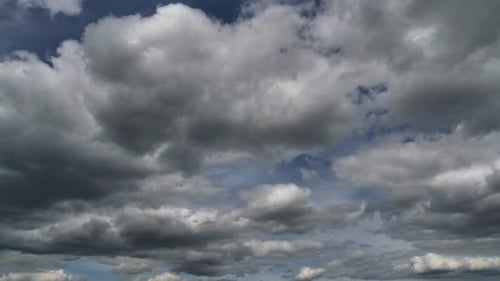 Clouds Moving Across a Blue Sky