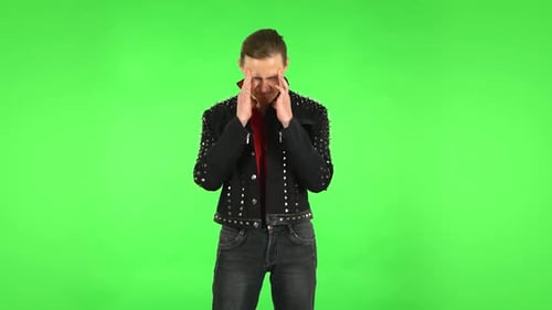 Guy Suffering From Headache From Fatigue. Green Screen