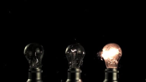 Lightbulb Exploding in Slow Motion on Black Background