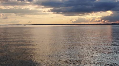 Scenic River at Sunset with Boat