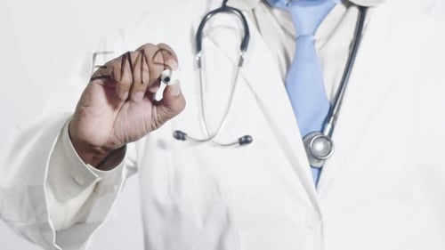 Doctor Writes EMS on Clear Surface