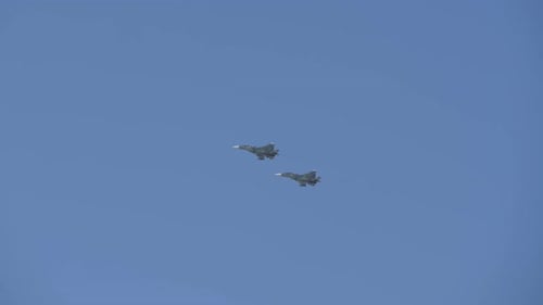 Supersonic Planes in the Blue Sky Perform Aerobatics. MIG Aircraft. Fighter Aircraft of Russia