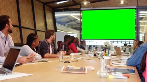 Adults in a Meeting with a Green Screen