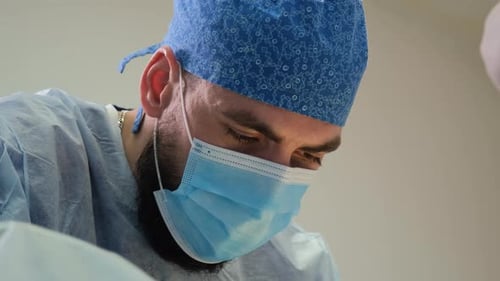 Close Up of Doctor Doing Surgery in the Hospital