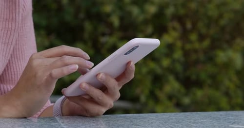 Close up of woman use of mobile phone