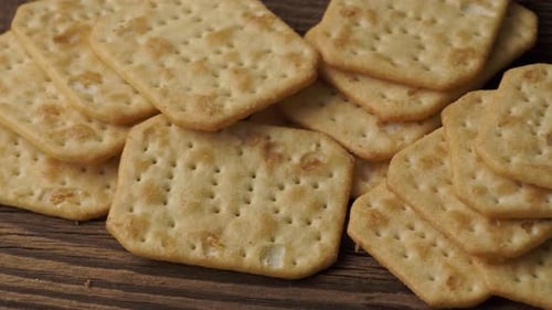 Close Up of Crispy Crackers on Wood