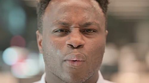 Close Up of African Man Having Toothache