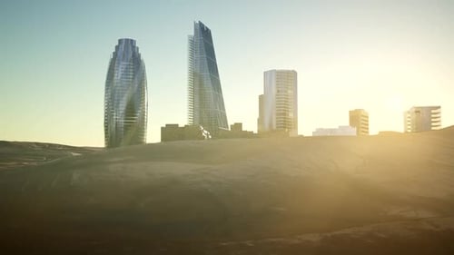 Wolkenkratzer der Stadt in der Wüste bei Sonnenuntergang