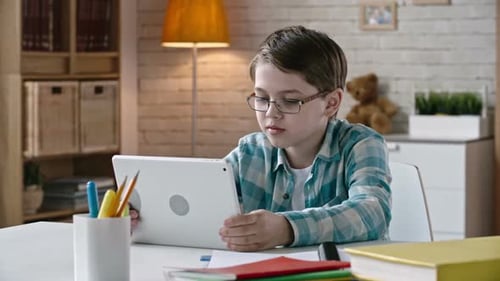 Kid Communicating via Tablet
