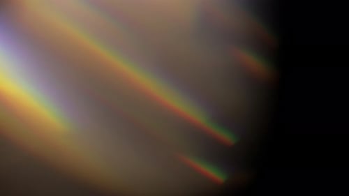 Colorful Light Leaks Against a Dark Backdrop