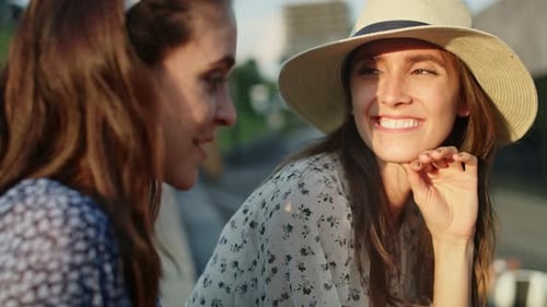 Video of two friends sitting and talking to each other. Shot with RED helium camera in 8K.