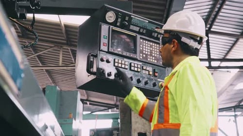 Smart Factory Worker Using Machine in Factory Workshop