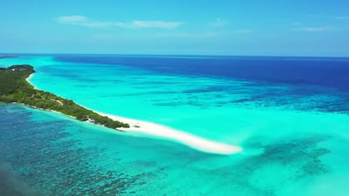 Aerial drone shot sky of perfect sea view beach trip by blue sea with white sandy background of jour