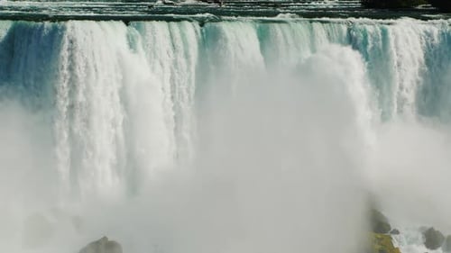 The Water Wall of Niagara Falls and the Bridge Over the River