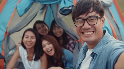 Group of Asia best friends teenagers take selfie picture and video with phone camera enjoy happy.