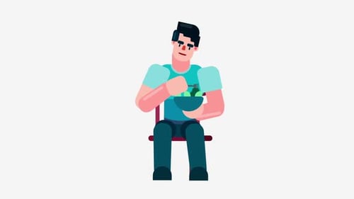 Young Man Sitting And Eating Healthy Salad