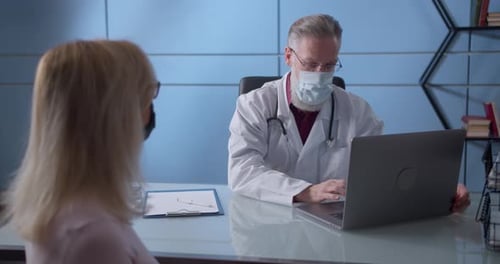 Doctor Consults with Patient in Modern Office