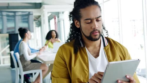 Male creative working in a modern office
