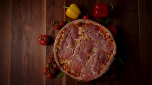 A Whole Rotating Pizza with Ham