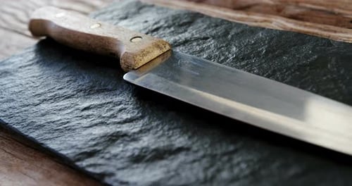 kitchen knife on stone board