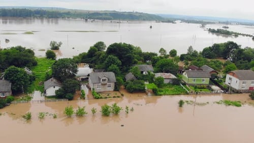 People Who Are in a Flooded House By a River That Overflowed After Rain Floods. Ecological