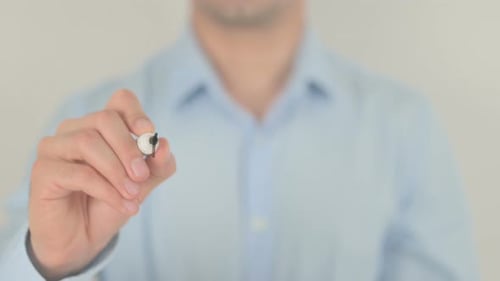 Man Writes Best Price on Transparent Surface